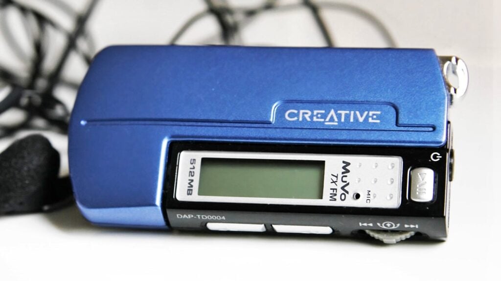 A Creative brand MP3 player, circa 2005. The main housing holds into a glorified USB stick that you can load songs into with your computer.